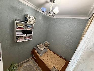 divar refleri: Ev satilir. 2 otagli ev 3 peredelka olunmuş. Kombisi var, senedleri — 1