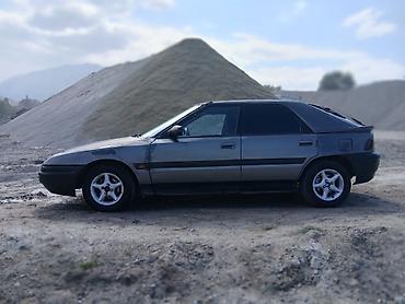 аксессуары для авто: Mazda 323: 1991 г., 1.8 л, Механика, Бензин, Хэтчбэк — 5