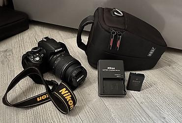 nikon: Зеркальная камера Nikon 3110 с комплектным набором для съемки. Состав — 1