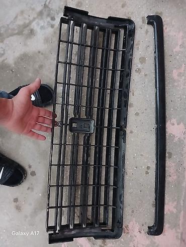 masin diskleri: VAZ 2107 radiator barmaqlığı maşının üsdünnən çıxıb — 2
