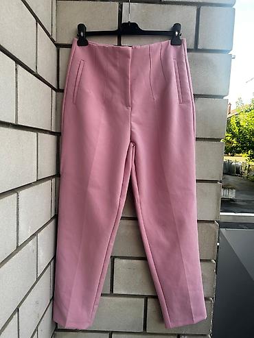 Set ženske odeće – pantalone i tri suknje Plava suknja sorc sa kaisem
