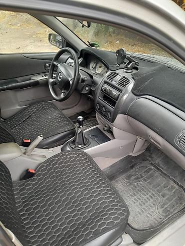 2 8: Mazda 323: 2003 г., 1.6 л, Механика, Бензин, Седан — 5