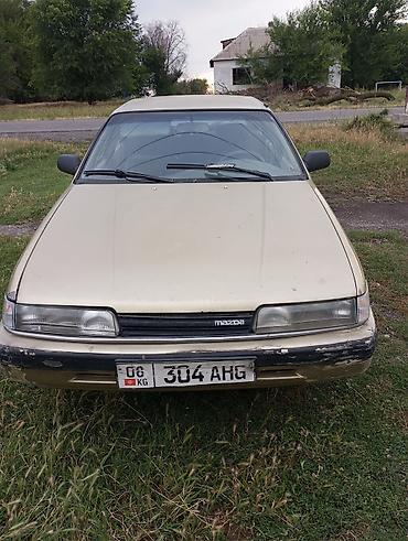 ом 615: Mazda 626: 1994 г., 0.2 л, Механика, Бензин, Седан — 1