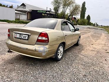 нур мото: Daewoo Nubira: 1999 г., 1.6 л, Механика, Бензин, Седан — 3