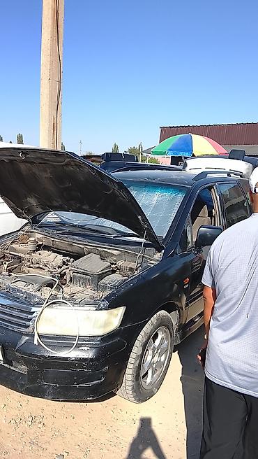 авто муссо: Mitsubishi : 1999 г., Автомат, Бензин — 2