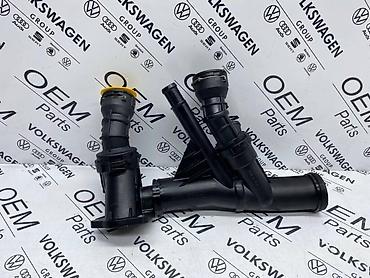 3 103: TERMOSTAT SA RACVOM ZA VOLKSWAGEN TIGUAN, TOURAN, GOLF 7 . - 04L 121 — 1
