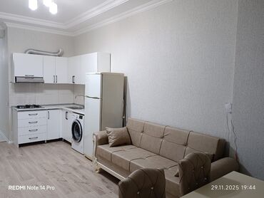 Uzunmüddətli kirayə mənzillər: Yeni tikili binada işıqlı 2 otaqlı studya mənzil.Butun əşyaları ilə — 12