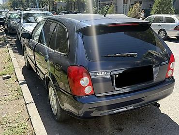 mazda mx5: Mazda 323: 2002 г., 1.6 л, Механика, Бензин, Хэтчбэк — 4