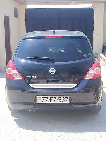 disk: Nissan Tiida hatchback - Kuzov: 5 qapılı hatchback, qara rəng - — 3