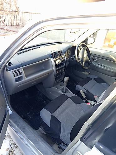 Mazda: Mazda Demio: 2001 г., 1.5 л, Автомат, Бензин, Седан — 7