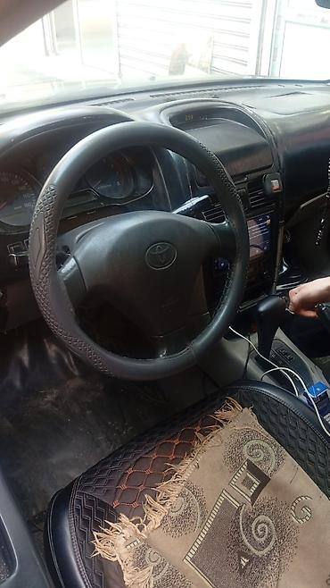 cesqa masin: Toyota Carina E Universal (station wagon) - Kuzov: universal, qara — 5
