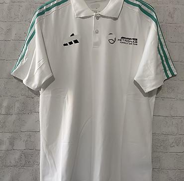 куртки поло: Поло Mercedes-AMG PETRONAS Formula One Team - Цвета: белый и черный - — 1
