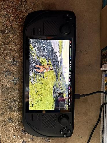 ok mobile: Портативная игровая консоль Valve Steam Deck oled 512GB Состояние — 1