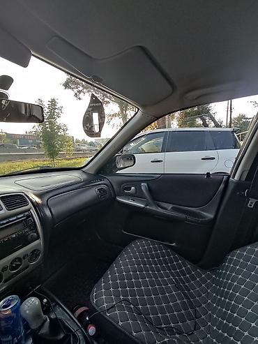 Mazda: Mazda 323: 2002 г., 1.6 л, Механика, Бензин, Универсал — 7