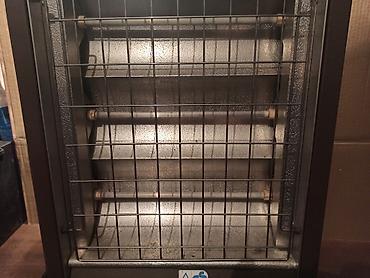 Kaloriferi: Mala kvarcna peć snage 1200W (3 x 400W) sa termostatom. Potpuno — 3