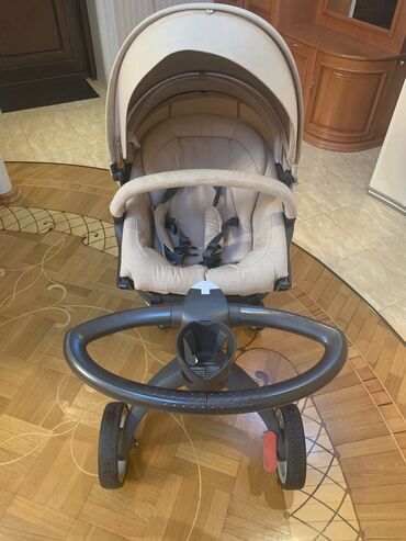 Gəzinti arabaları: FIDANONUR…Kolyaska Stokke ela veziyyetdedir. Lyulkasiz. Unvan: Reshid