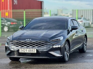 машина кейж: Kia K: 2022 г., Гибрид, Седан