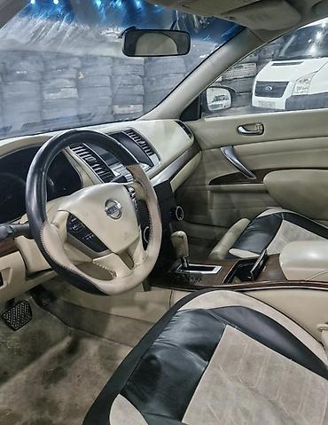 nissan wingroad: Nissan Teana – biznes sinfi sedan Xüsusiyyətlər: - Korpus: qara rəng — 7