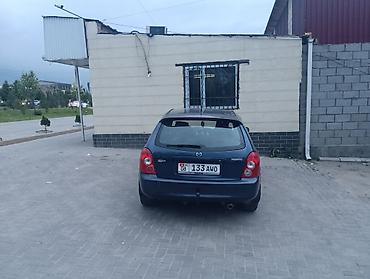 пороги демио: Mazda Familia: 2002 г., Механика, Универсал — 2