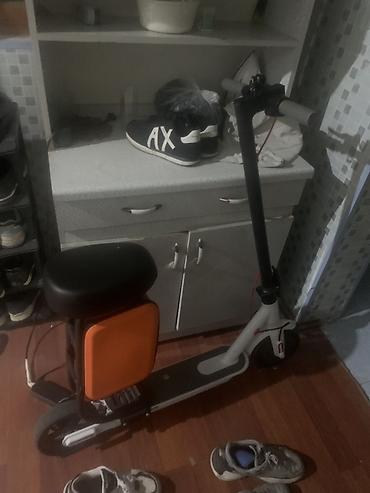 Электротранспорт: Elektrik skuter – oturacaqlı model - Praktik elektrik skuter, ön — 2