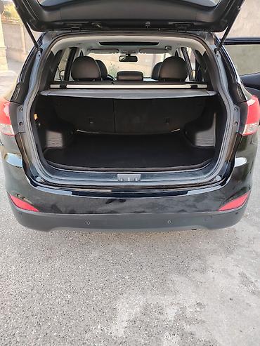 panorama maşın: Hyundai Tucson: 0.2 l | 2009 il Krossover — 9