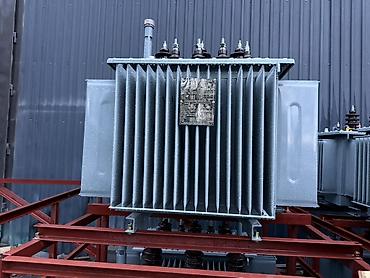 Силовые трансформаторы: Масляный силовой трансформатор с радиаторными панелями охлаждения — 17