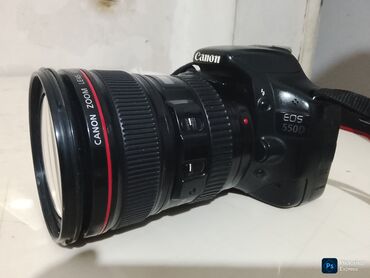 ред ми телефон: Цифровая зеркальная камера Canon EOS 550D в черном цвете. Оснащена