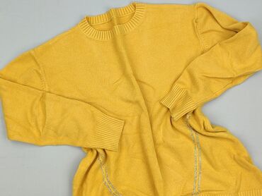 Żółty sweter damski o luźnym kroju, idealny na co dzień. Posiada