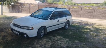 фит маш: Белый универсал Subaru Legacy (поколение конца 90‑х) с левым рулём