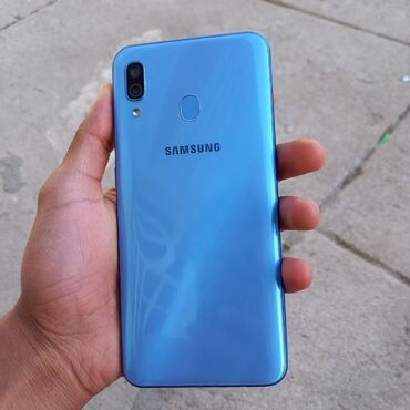 xiaomi redmi note 9 's: Samsung Galaxy A30, 32 GB, rəng - Göy, Düyməli, Barmaq izi, Simsiz şarj