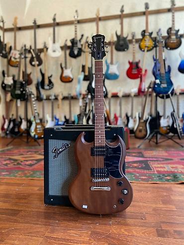 Gitaralar: Epiphone SG VE walnut VE SPECIAL

Ünvan: Nizami küçəsi 42 — 1