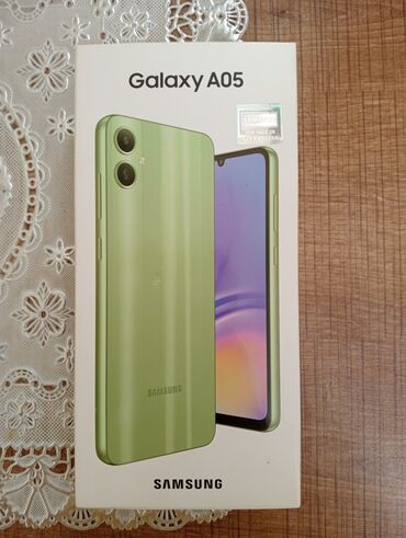 телефон флай fs401: Samsung Galaxy A05, 64 ГБ, цвет - Зеленый, Сенсорный, Отпечаток пальца, Face ID