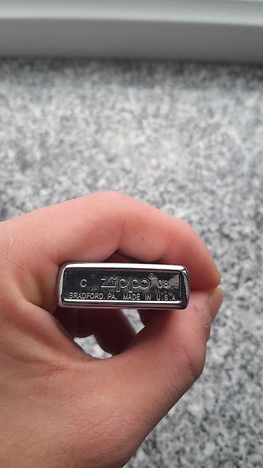 a herifi: Məhsul: Zippo benzinli alışqan Təsvir: - Orijinal Zippo, alt hissədə — 3