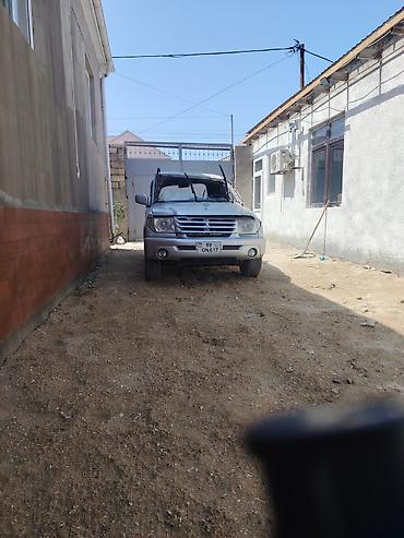uaz qaz 69 satilir: UAZ Patriot, gümüşü rəng. Güclü off-road potensialına malik geniş SUV — 1