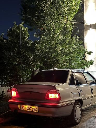 тонировка авто: Услуги тонировки автомобилей. На фото показан процесс выполнения — 2
