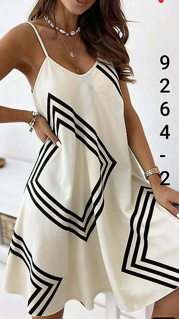 Haljine: Letnja haljina na tanke bretele - Kroj: lepršava A-linija, midi — 9