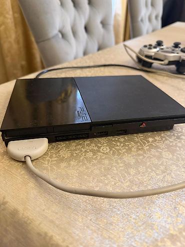 ps5 slim digital: Playstation 2 slim yaxsi vezyetde .2 pult ve 2 disk.1 pult islemir — 1