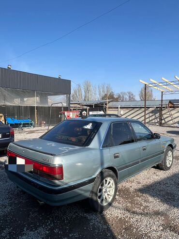 посадка авто: Mazda 626: 1991 г., 2 л, Механика, Бензин, Седан
