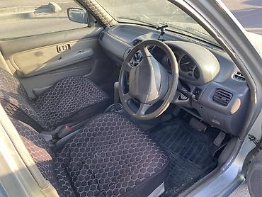 мд регион: Nissan March: 1998 г., 1 л, Автомат, Бензин, Хэтчбэк — 7