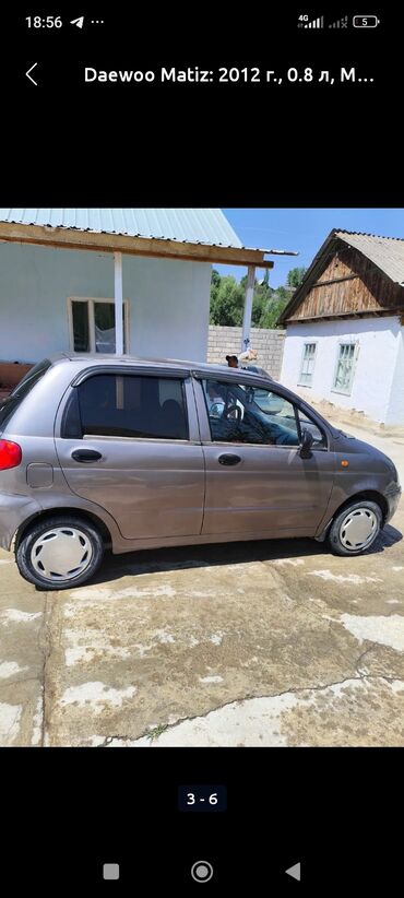 машины на обмен: Автомобиль Daewoo Matiz 2012 года выпуска, представленный в сером