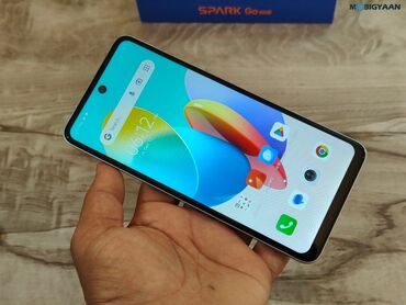 Tecno Spark Go 2024, 128 ГБ, цвет - Черный, Сенсорный, Отпечаток пальца, Две SIM карты