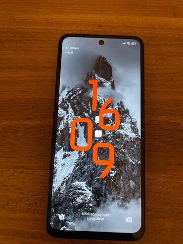 Xiaomi: Xiaomi 12, 128 ГБ, цвет - Черный, 
 Отпечаток пальца, Две SIM карты, Face ID