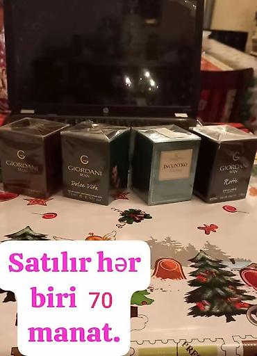 Ətriyyat: Oriflame brendinə aid "Dancing Lady Hypnotic Night" ətri. Bu ətir 50 — 36