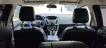 Продажа авто: Ford Focus: 2014 г., 1.6 л, Механика, Бензин, Универсал — 4