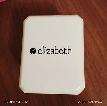 tifani sep: Qızılı rəngdə, dəbli zəncir formalı qolbağı olan Elizabeth "Fashion — 5