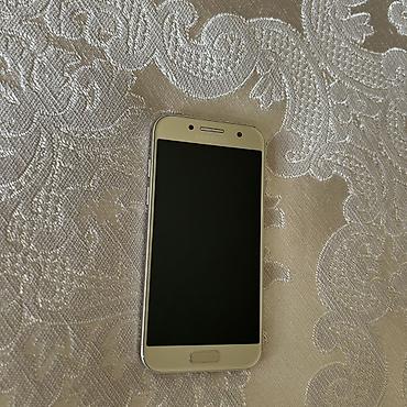 a3 samsung 2015: Samsung Galaxy A3 2017, 16 GB, rəng - Qızılı, Barmaq izi — 1