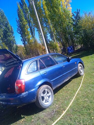 глушитель фольксваген: Mazda Familia: 2002 г., 1.6 л, Автомат, Бензин, Хэтчбэк