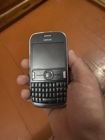 трехсимочный телефон fly: Nokia Asha 502 Dual Sim, цвет - Серый, Кнопочный