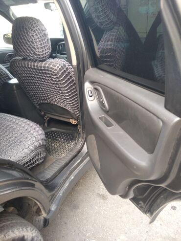 Mazda: Mazda Tribute: 2.3 l | 2004 il Ofrouder/SUV — 16