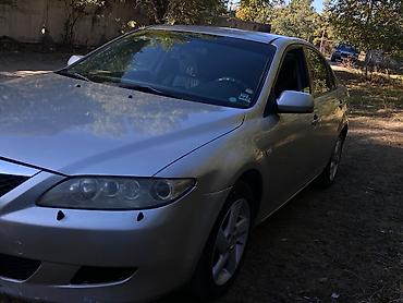 xedos 9: Mazda 6: 2004 г., 2 л, Механика, Бензин, Хэтчбэк — 1